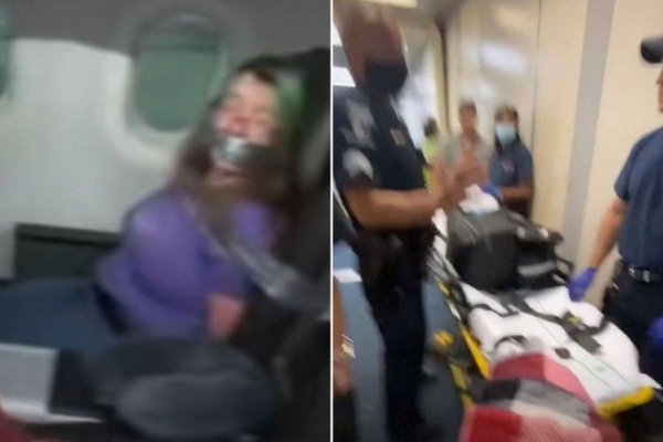 Uçağın Kapısını Açmaya Çalışan Kadını Koli Bandıyla Bağladılar